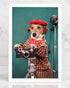 Postcard with a dog wearing a beret and holding a camera, placed on a marble surface.