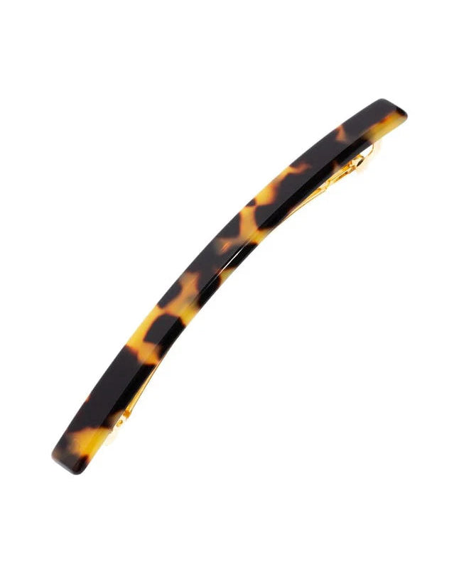 Tortoiseshell hair clip on a white background